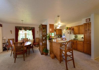 Dining & Kitchen Area with appliances and dining room table