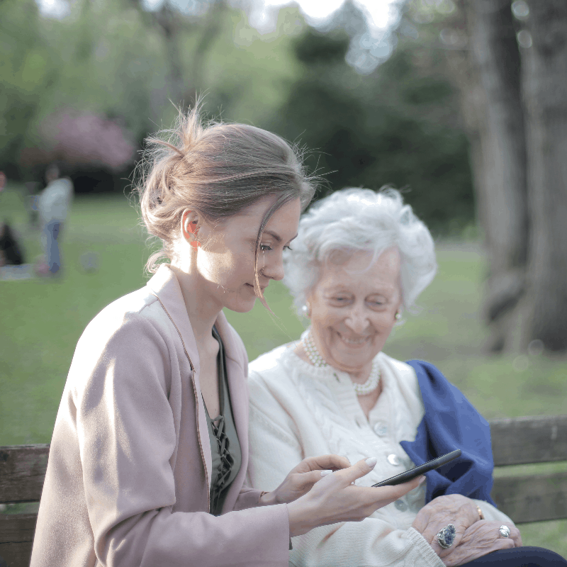 Young Women sitting and talking with Older Women