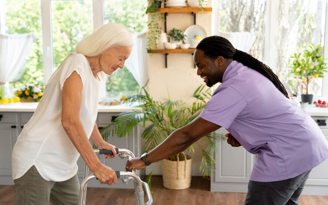 Health care professional aides woman using a walk assist device through a kitchen
